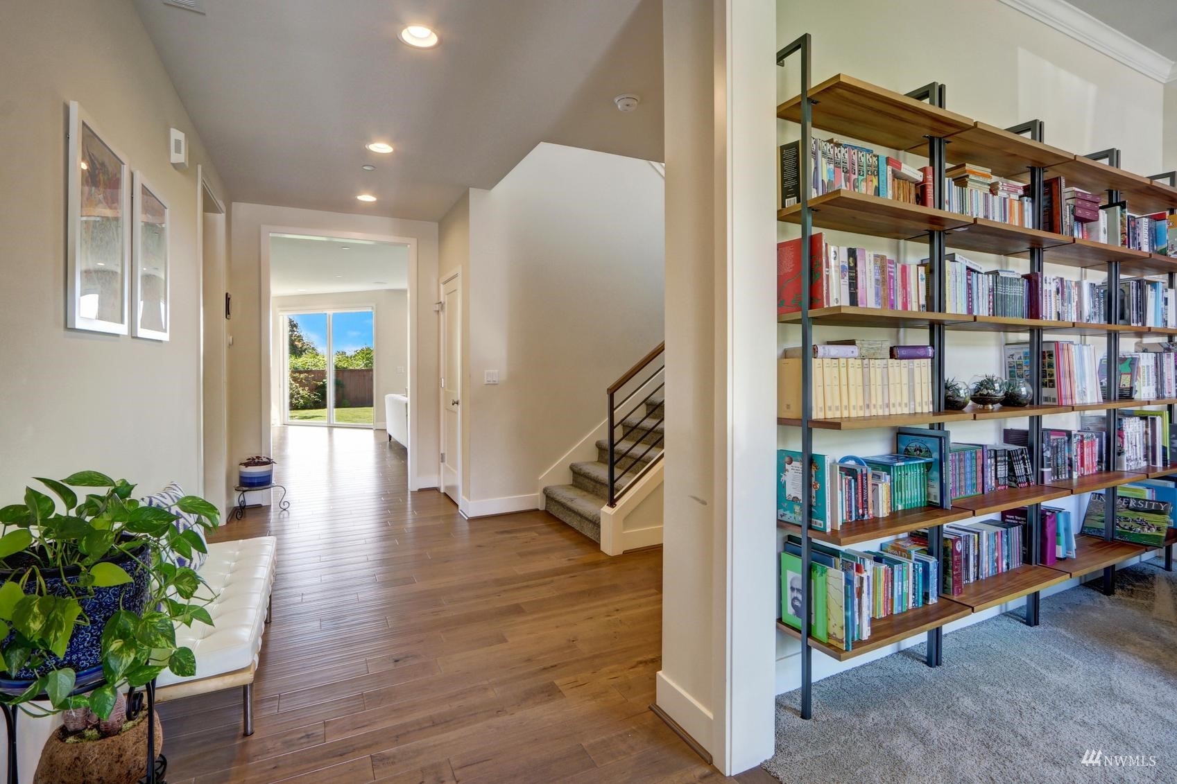 4321 231st Place Southeast Bothell, WA 98021 - Photo 5 of 40 a view of an entryway with workspace and wooden floor