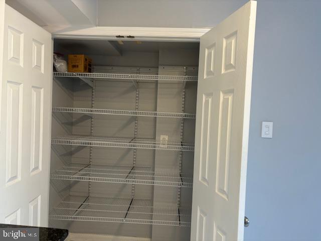 7900 Spring Forest Court Springfield, VA 22152 - Photo 12 of 40 a bathroom with a walk in closet and a window