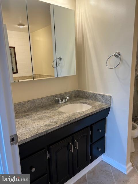 7900 Spring Forest Court Springfield, VA 22152 - Photo 25 of 40 a bathroom with a granite countertop sink and a mirror