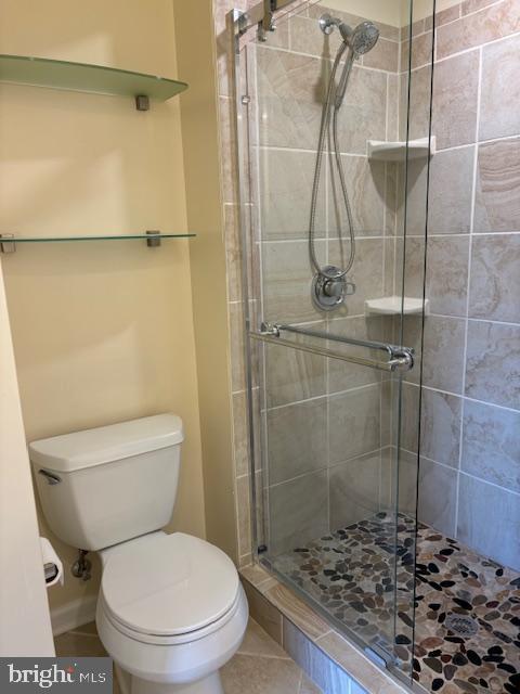 7900 Spring Forest Court Springfield, VA 22152 - Photo 28 of 40 a bathroom with a toilet and a shower