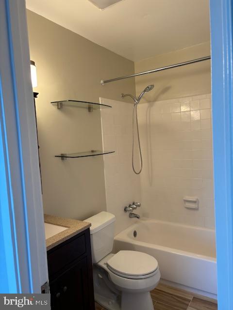 7900 Spring Forest Court Springfield, VA 22152 - Photo 33 of 40 a bathroom with a granite countertop bathtub shower sink vanity and toilet
