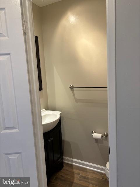 7900 Spring Forest Court Springfield, VA 22152 - Photo 34 of 40 a bathroom with a sink and mirror