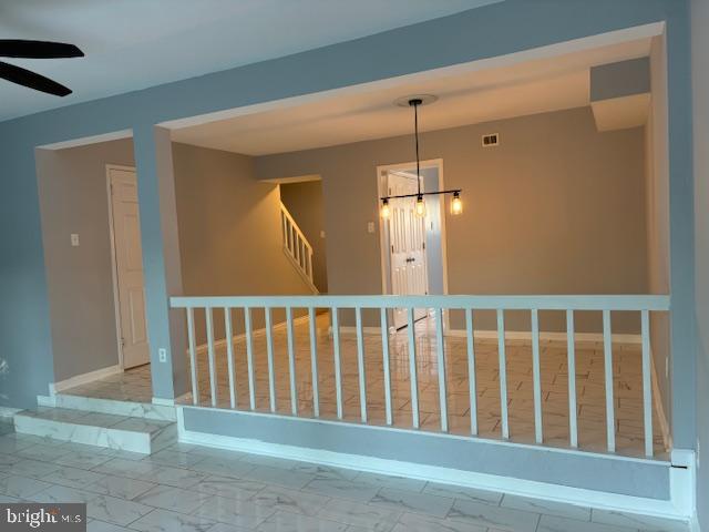 7900 Spring Forest Court Springfield, VA 22152 - Photo 5 of 40 a view of a hallway with windows