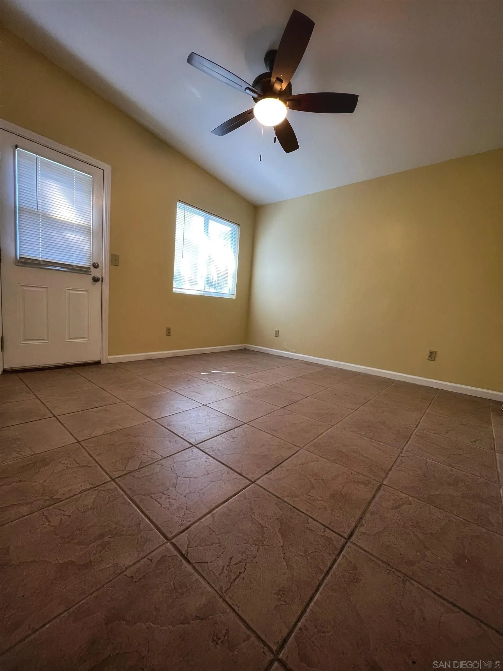 714 Convertible Lane Fallbrook, CA 92028 - Photo 17 of 28 a view of an empty room with a window