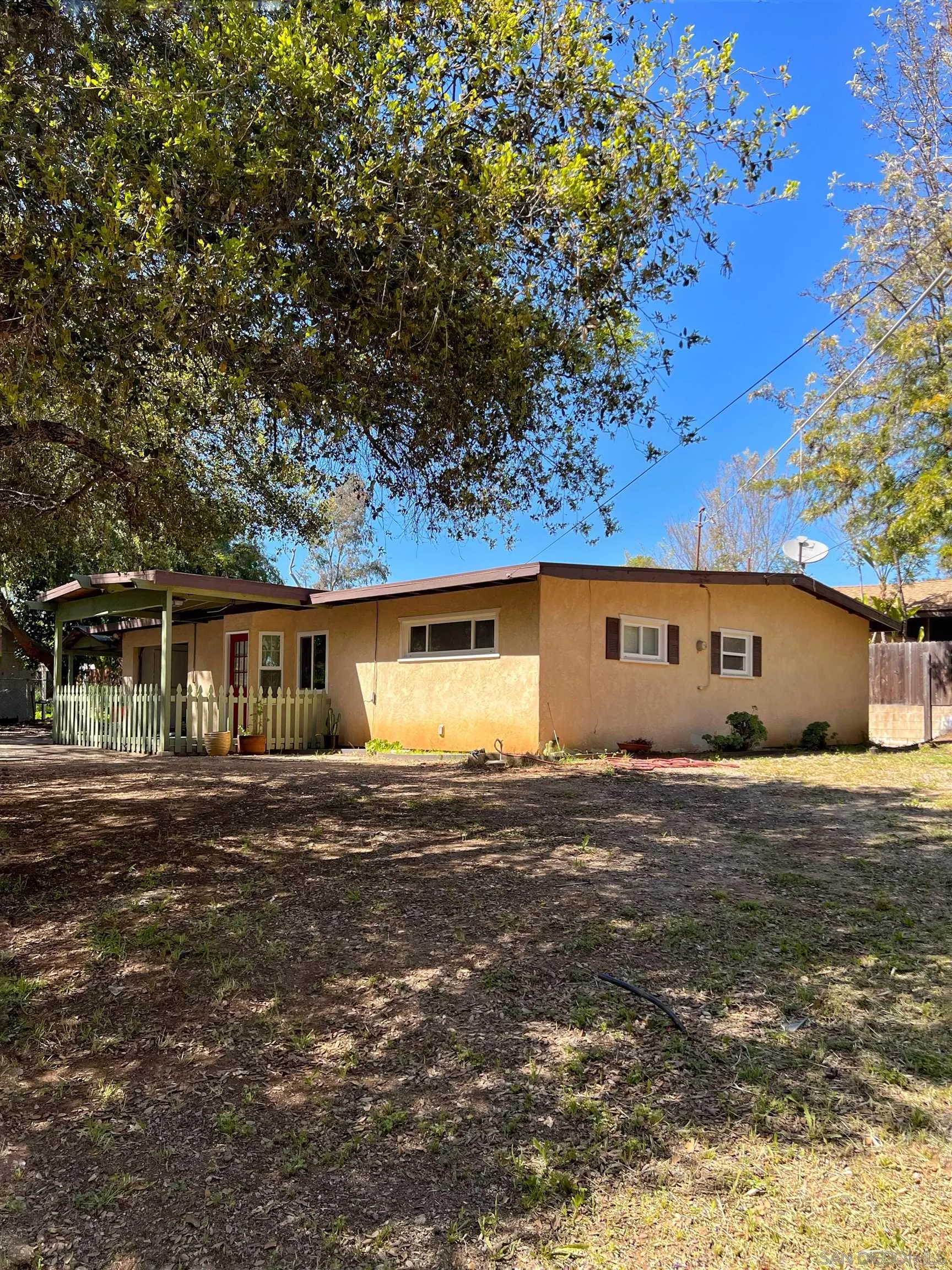 714 Convertible Lane Fallbrook, CA 92028 - Photo 22 of 28 a front view of house with yard