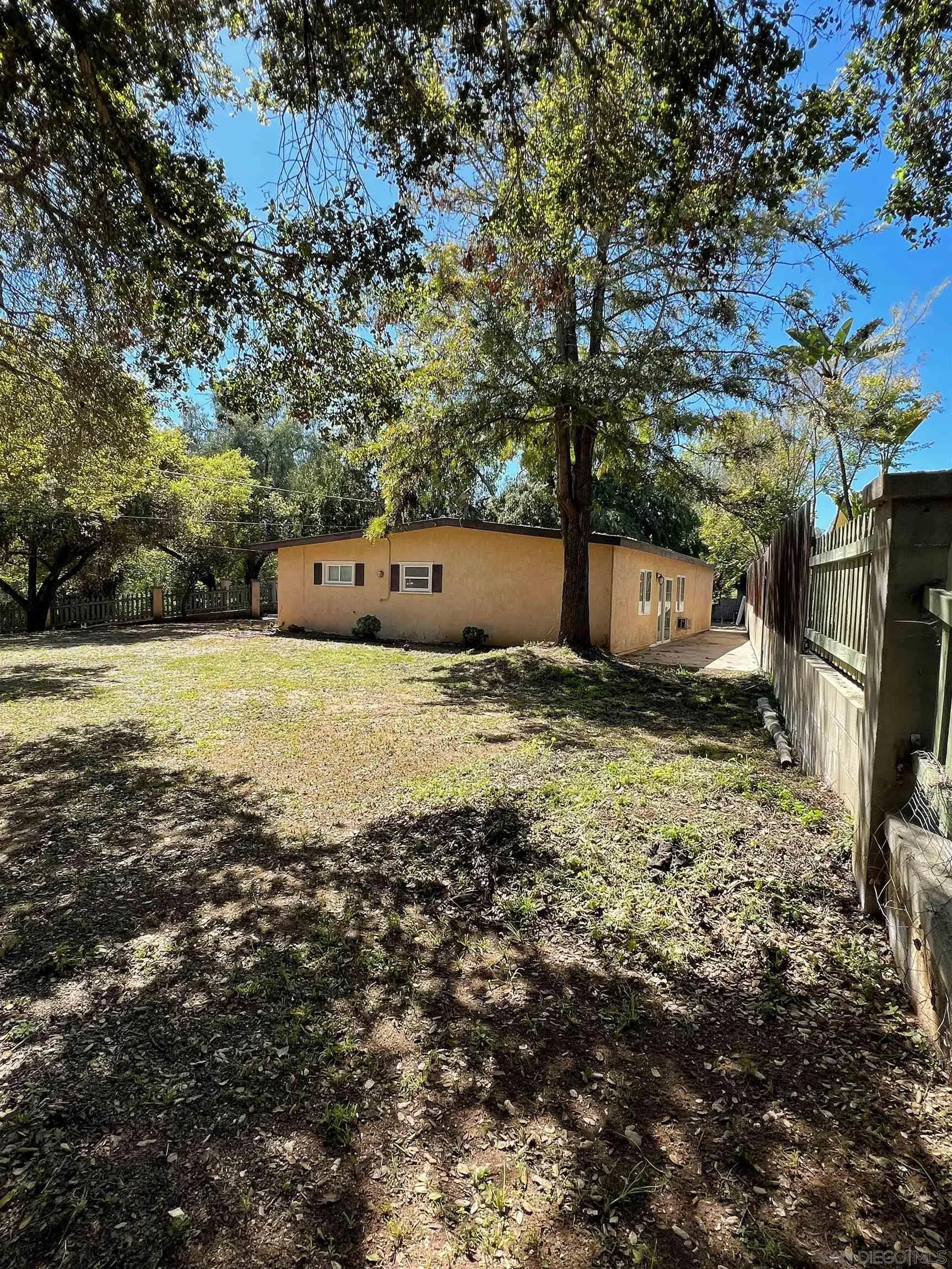 714 Convertible Lane Fallbrook, CA 92028 - Photo 24 of 28 a view of a tree in front of a house