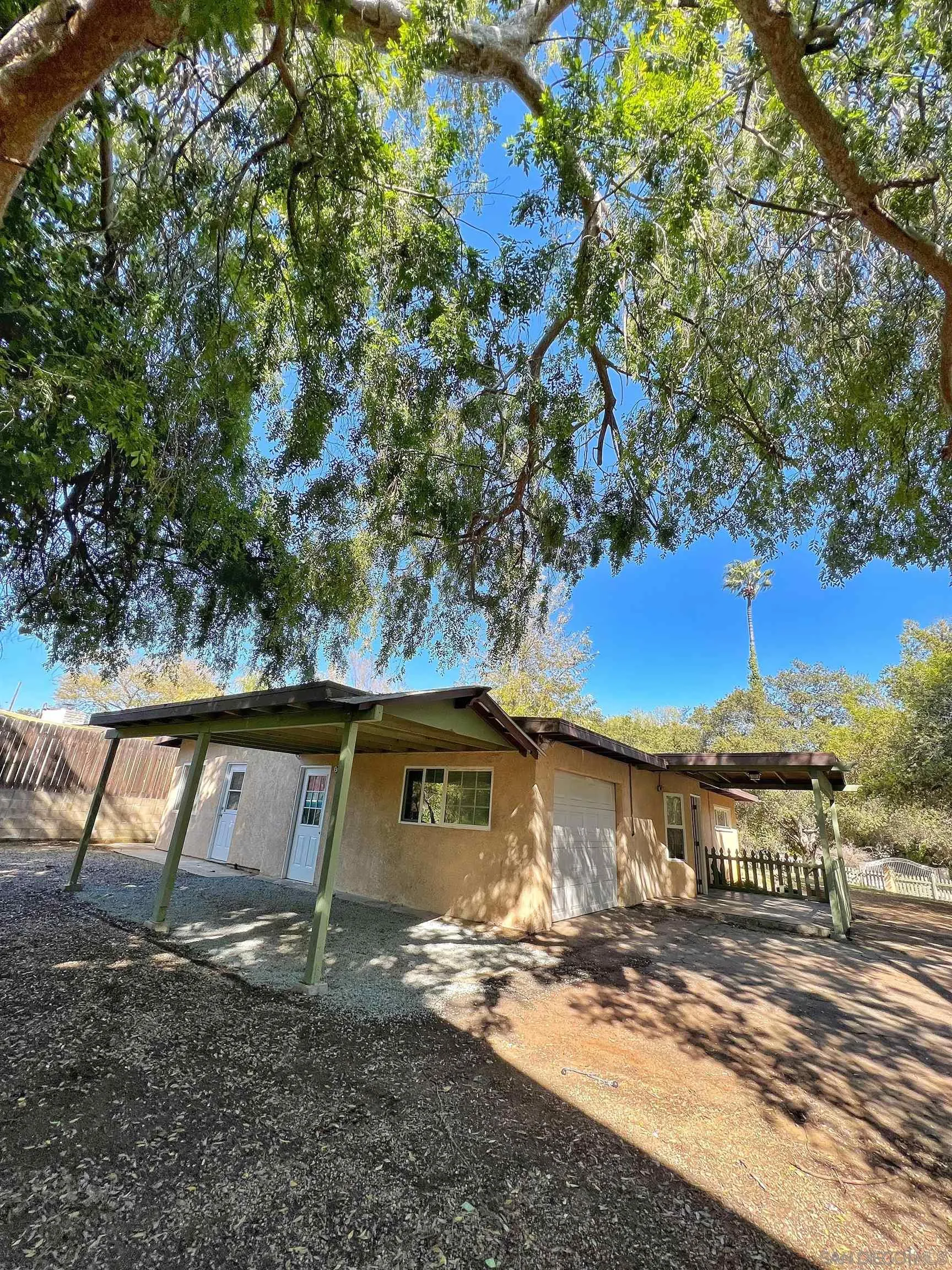 714 Convertible Lane Fallbrook, CA 92028 - Photo 26 of 28 a view of a house with a patio