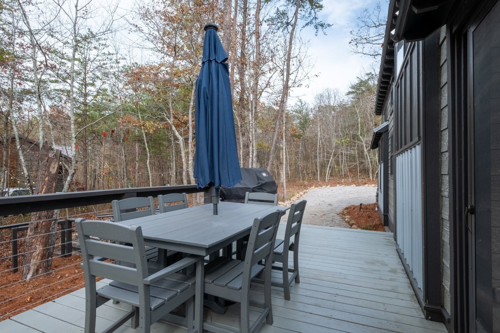 672 Waters Edge Way Tracy City, TN 37387 - Photo 26 of 81 a view of backyard with a table and chairs