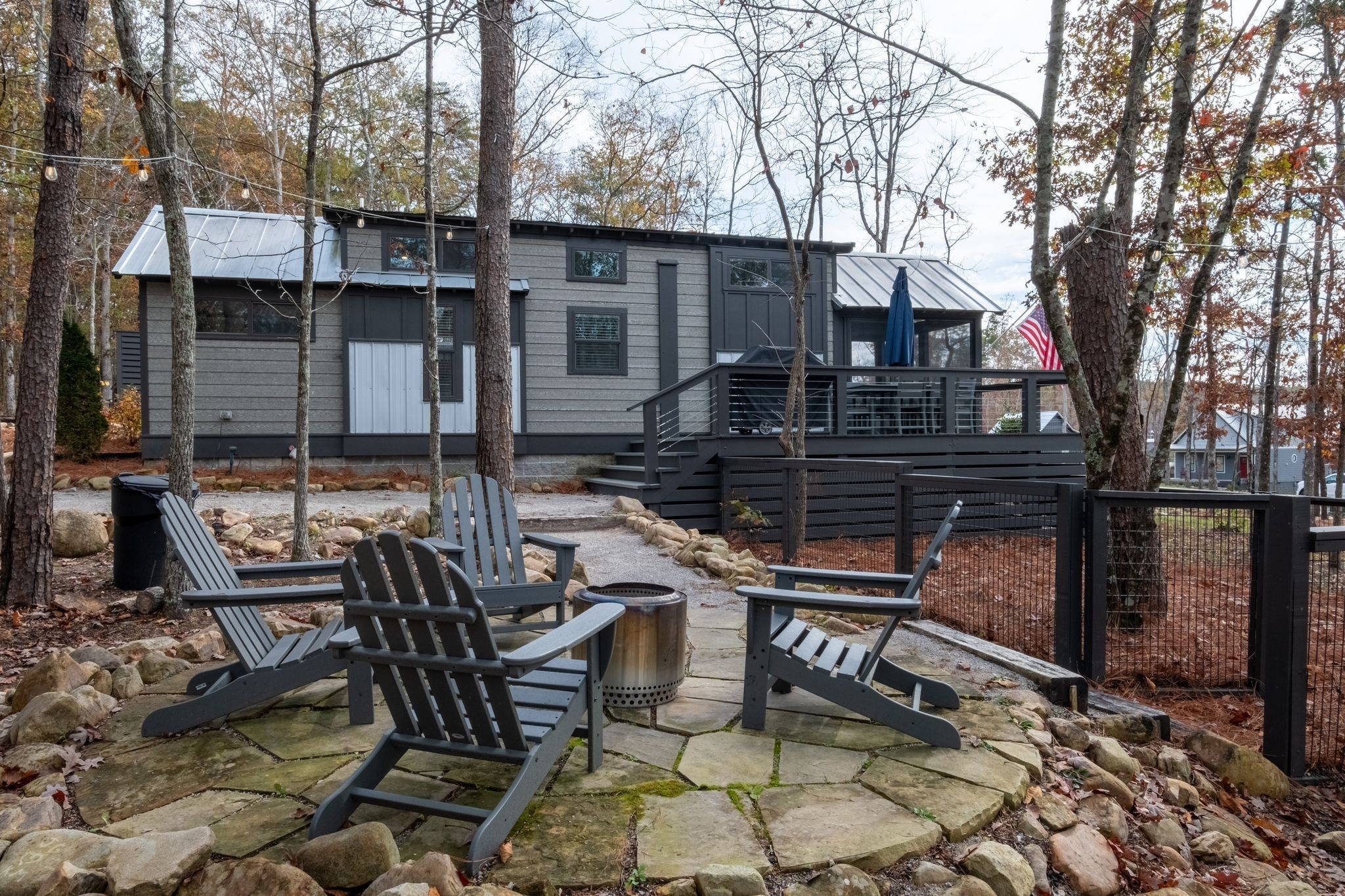 672 Waters Edge Way Tracy City, TN 37387 - Photo 27 of 81 a view of backyard with outdoor seating and plants