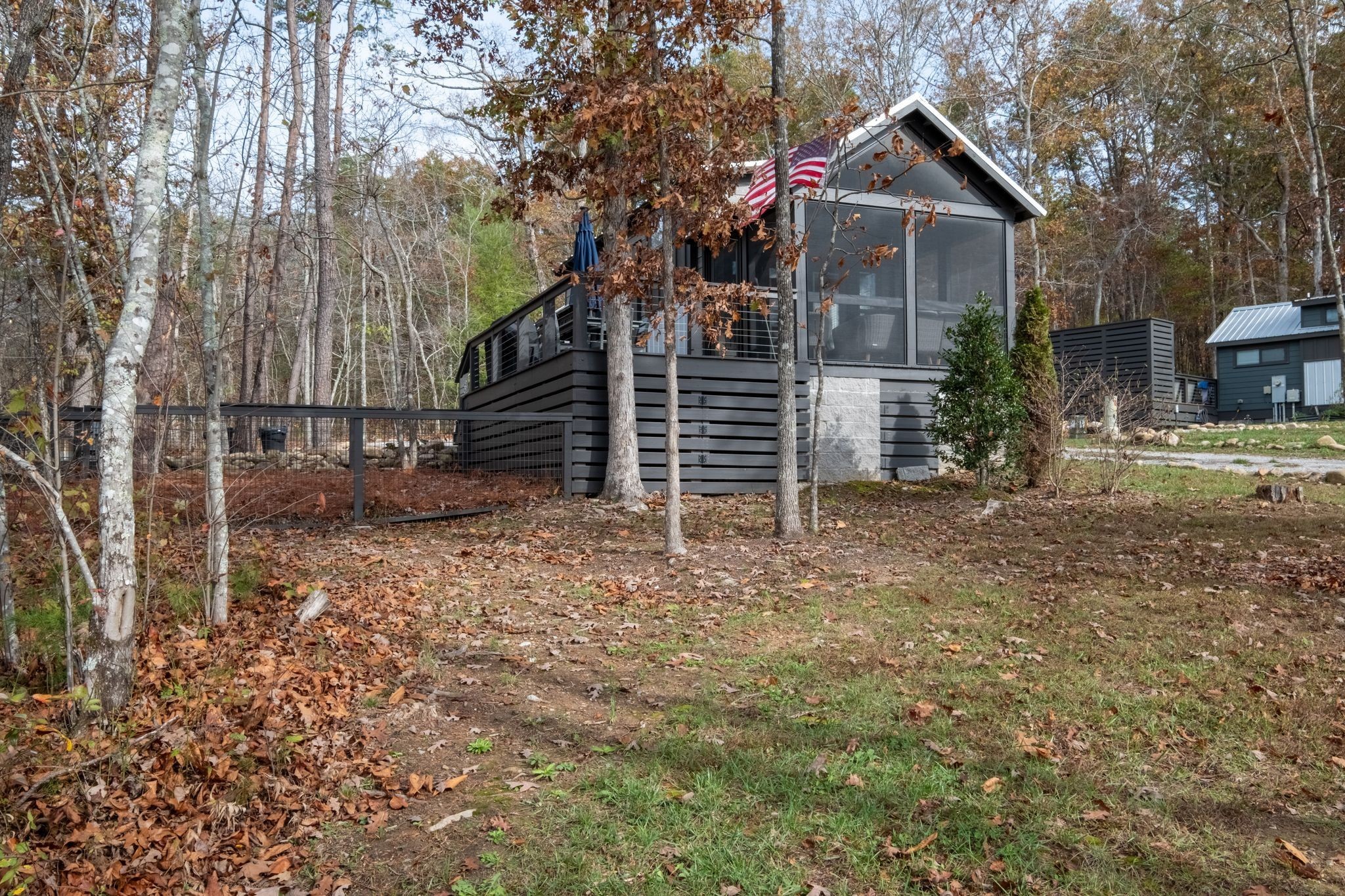 672 Waters Edge Way Tracy City, TN 37387 - Photo 32 of 81 a view of a house with a yard