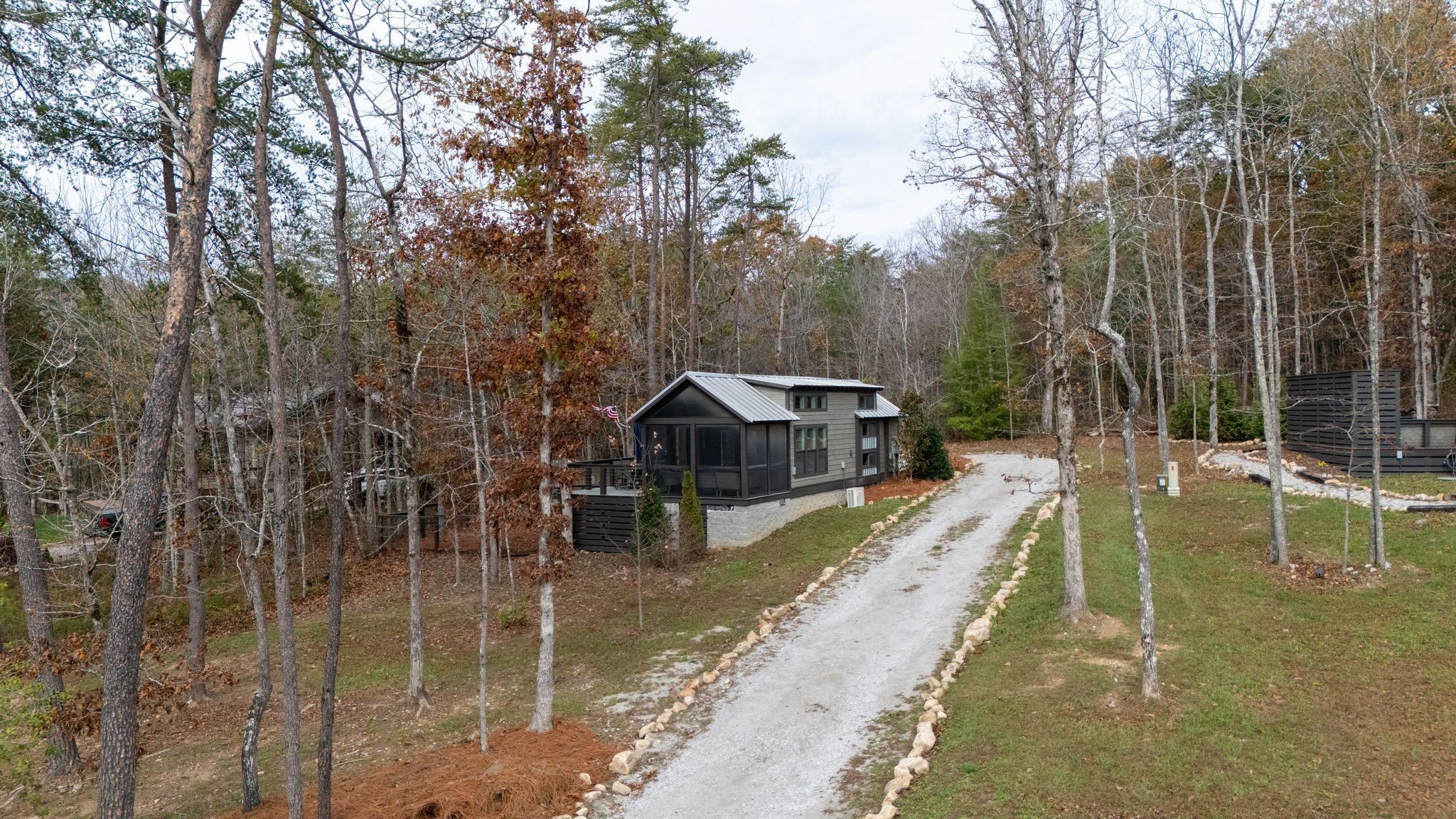 672 Waters Edge Way Tracy City, TN 37387 - Photo 39 of 81 a view of a house with a yard