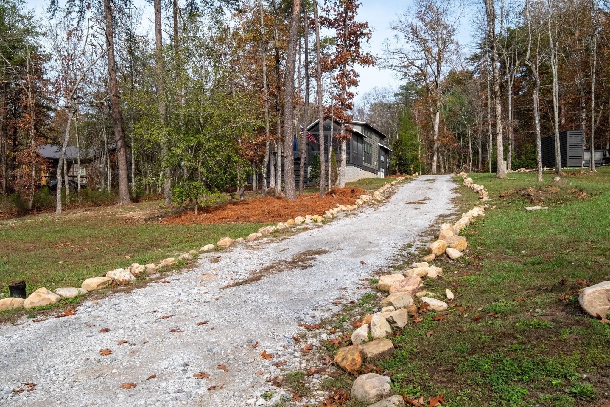 672 Waters Edge Way Tracy City, TN 37387 - Photo 41 of 81 a view of a backyard with large trees