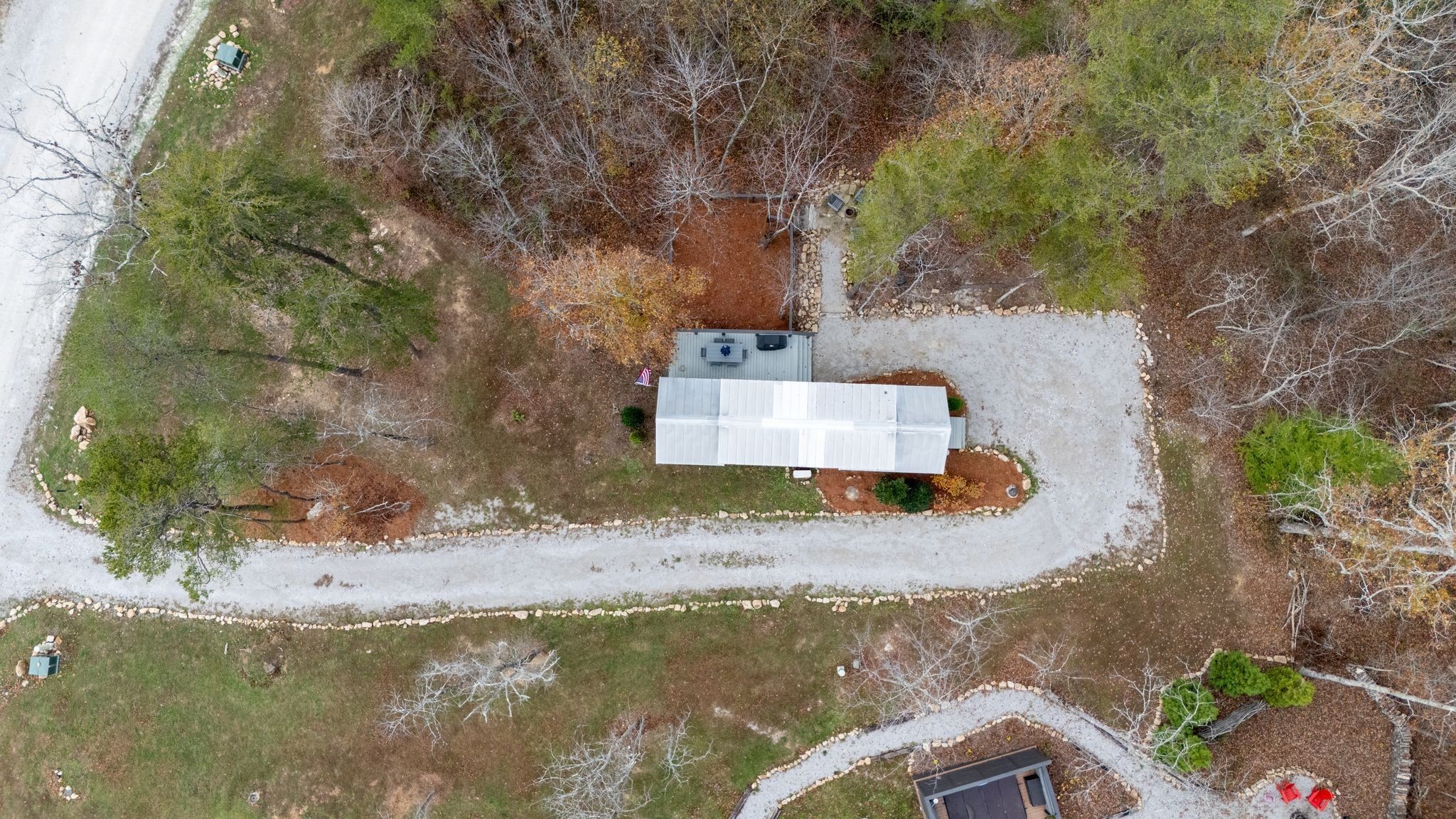 672 Waters Edge Way Tracy City, TN 37387 - Photo 49 of 81 a view of a house with a yard