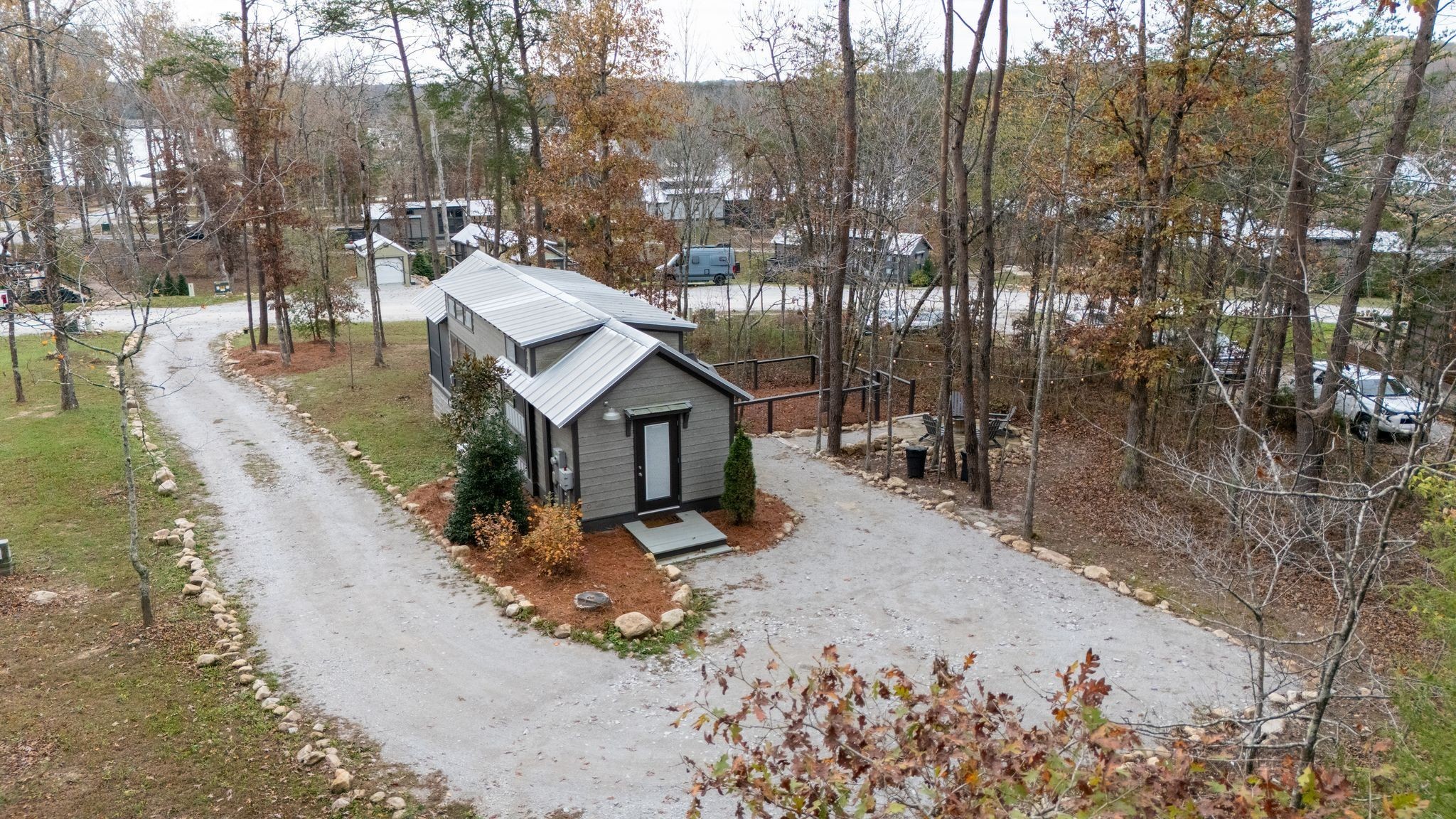 672 Waters Edge Way Tracy City, TN 37387 - Photo 53 of 81 a view of a house with a yard covered with snow in the background