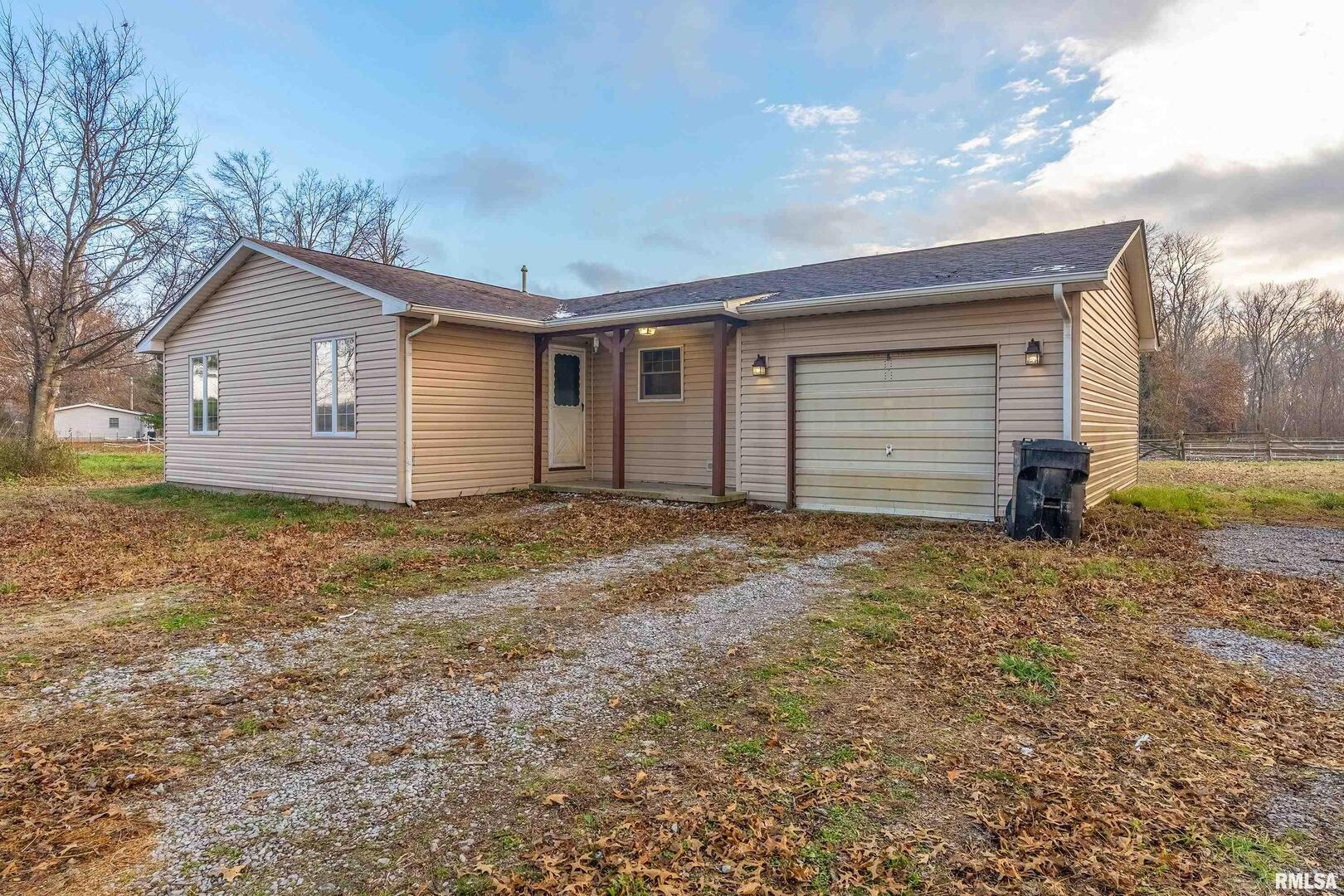 18662 Liberty School Road Thompsonville, IL 62890 - Photo 1 of 32 a house view with backyard space