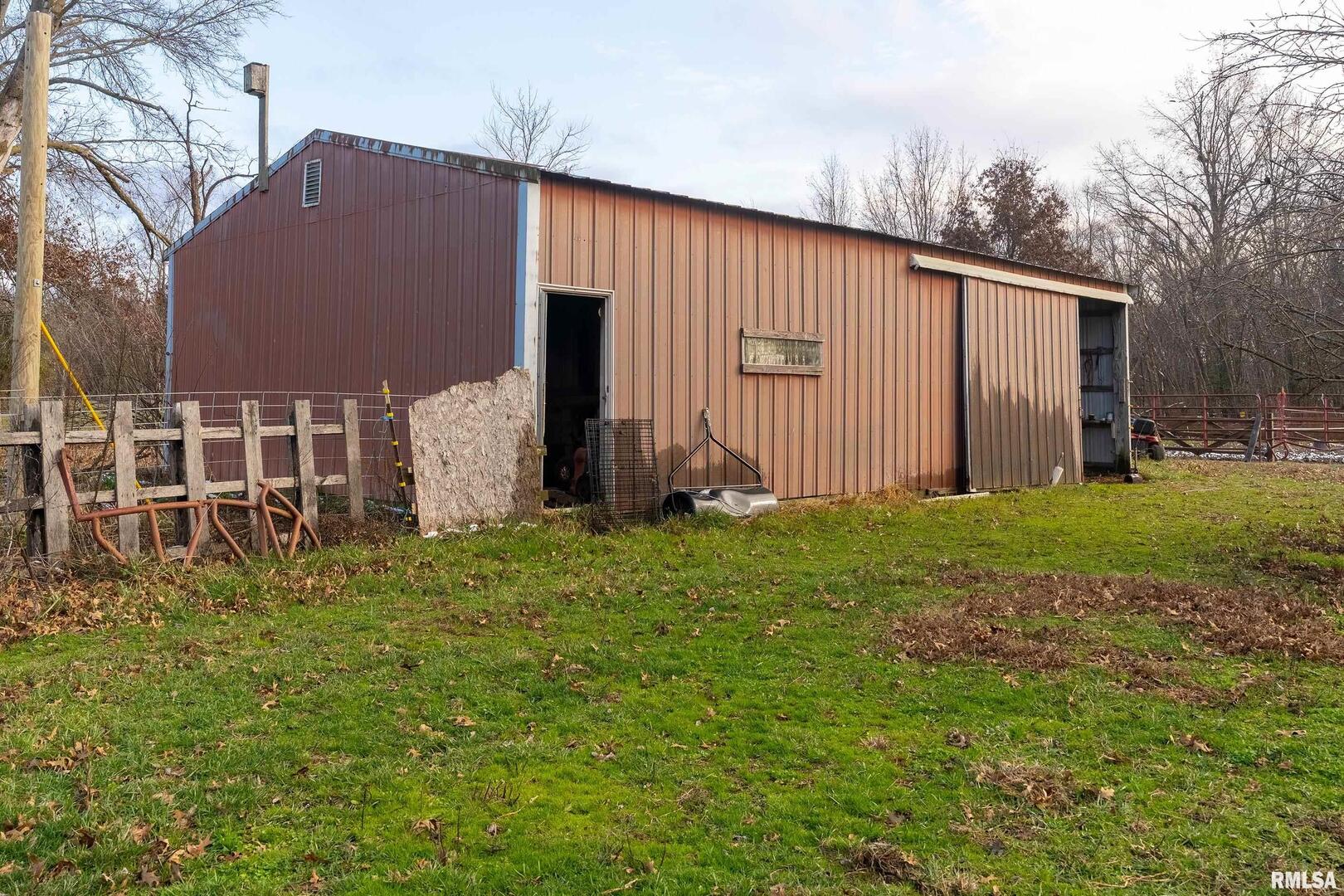 18662 Liberty School Road Thompsonville, IL 62890 - Photo 29 of 32 a backyard of a house with lots of green space