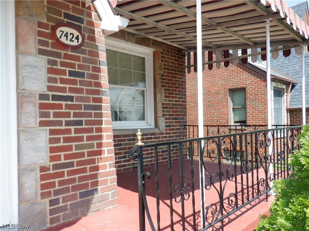 7424 Spring Garden Road, Unit R Cleveland, OH 44129 - Photo 2 of 22 front porch