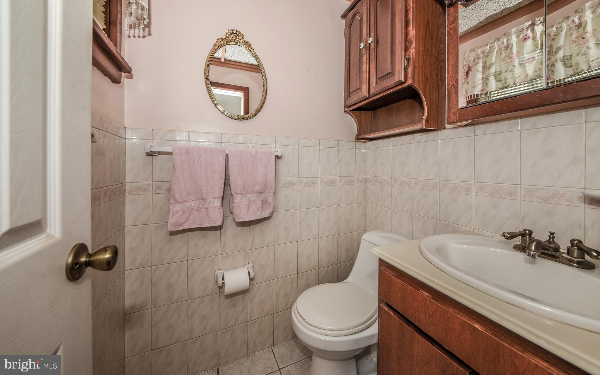 1484 West Street Road Warminster, PA 18974 - Photo 14 of 39 Powder Room off Family Room