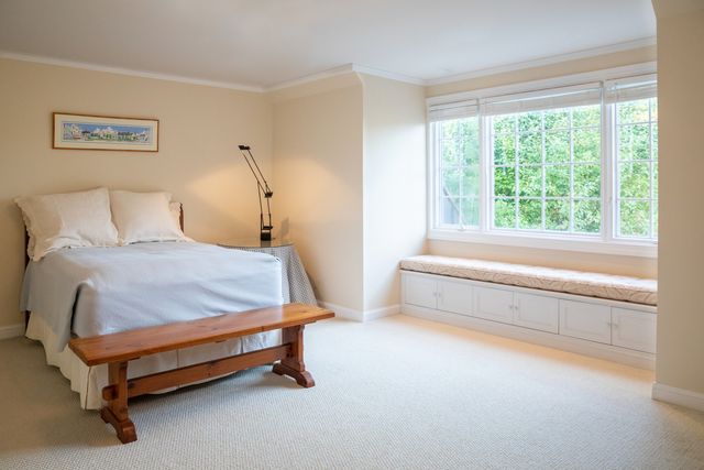 a outdoor space with patio the couches and dining table with a backyard