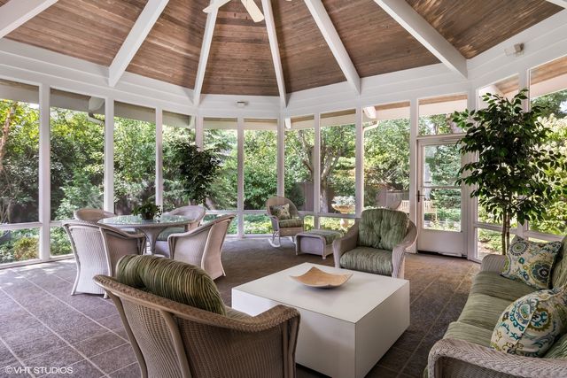 a backyard of a house with lots of green space