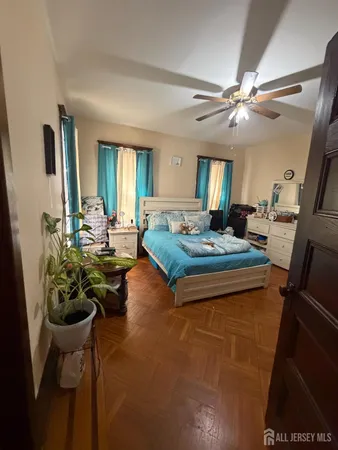 a kitchen with stainless steel appliances wooden cabinets and a stove top oven