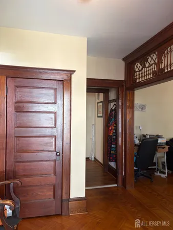 a view of a hallway with closet