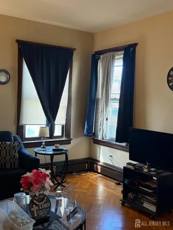 a room with furniture closet and a window