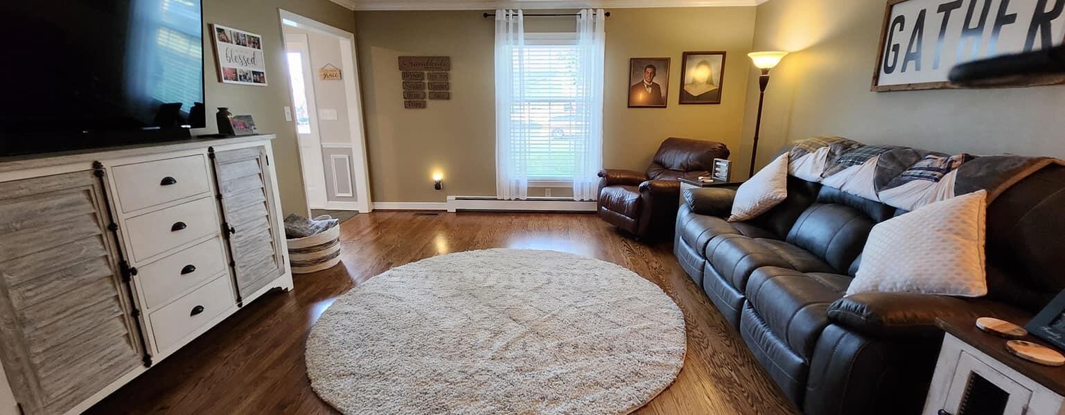 5257 North Spring Drive Northwest Roanoke, VA 24019 - Photo 12 of 47 a living room with furniture and a flat screen tv