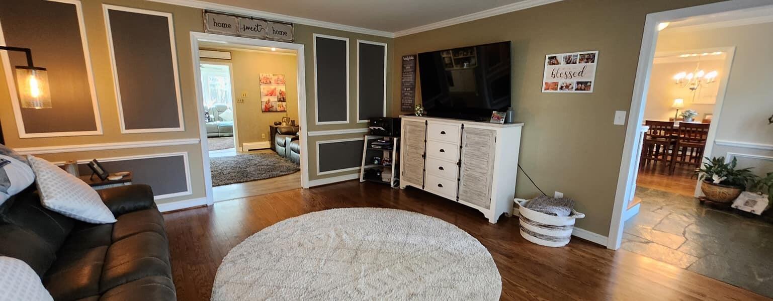 5257 North Spring Drive Northwest Roanoke, VA 24019 - Photo 14 of 47 a living room with furniture and a flat screen tv