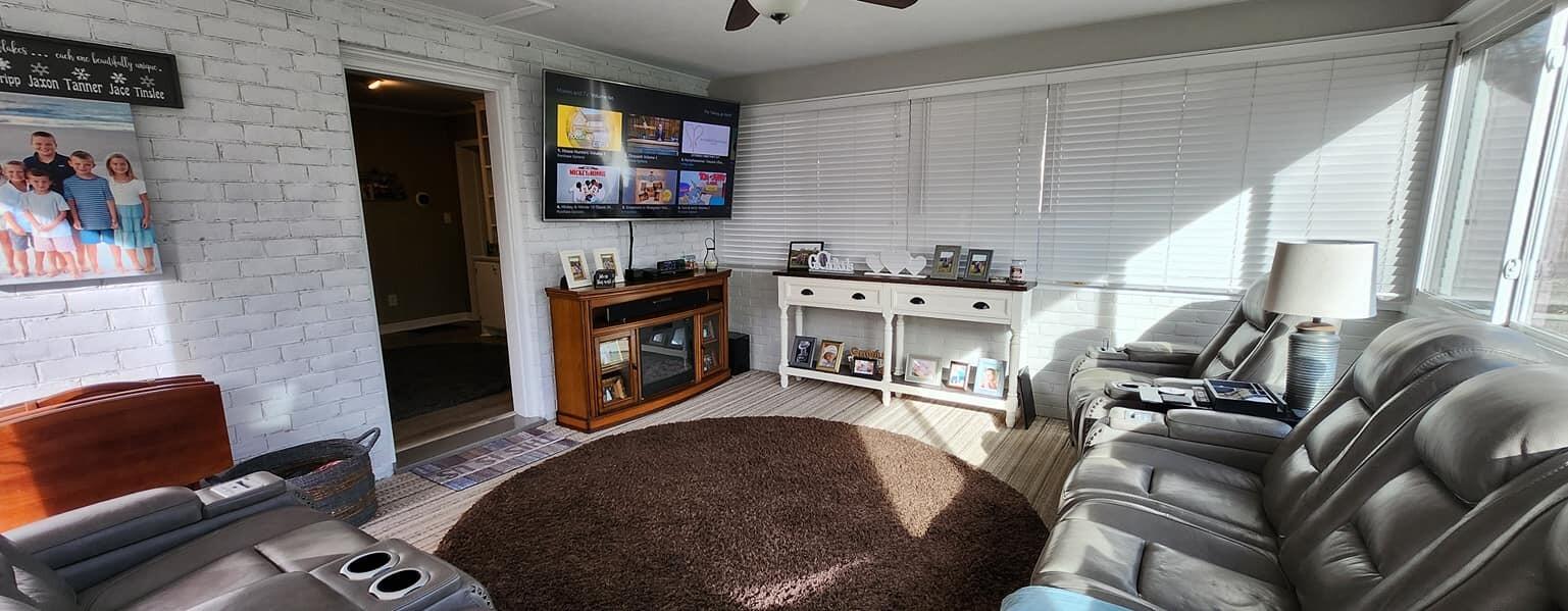 5257 North Spring Drive Northwest Roanoke, VA 24019 - Photo 16 of 47 a living room with furniture and a flat screen tv