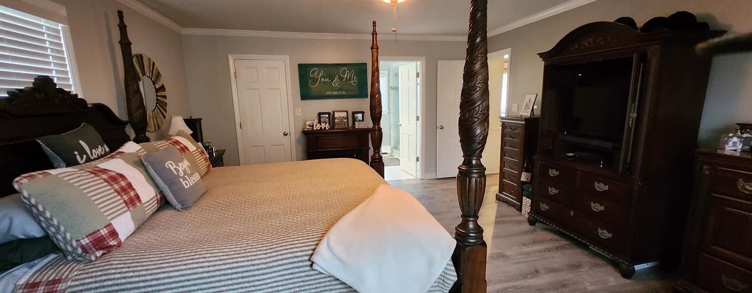 5257 North Spring Drive Northwest Roanoke, VA 24019 - Photo 20 of 47 a living room with furniture a walk in closet and a mirror