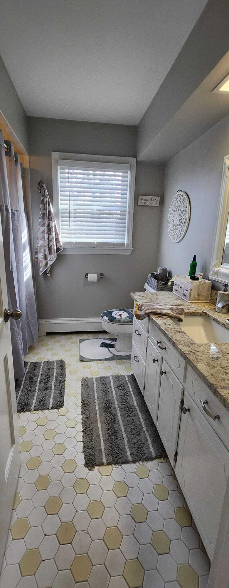 5257 North Spring Drive Northwest Roanoke, VA 24019 - Photo 27 of 47 a kitchen with a stove window and cabinets