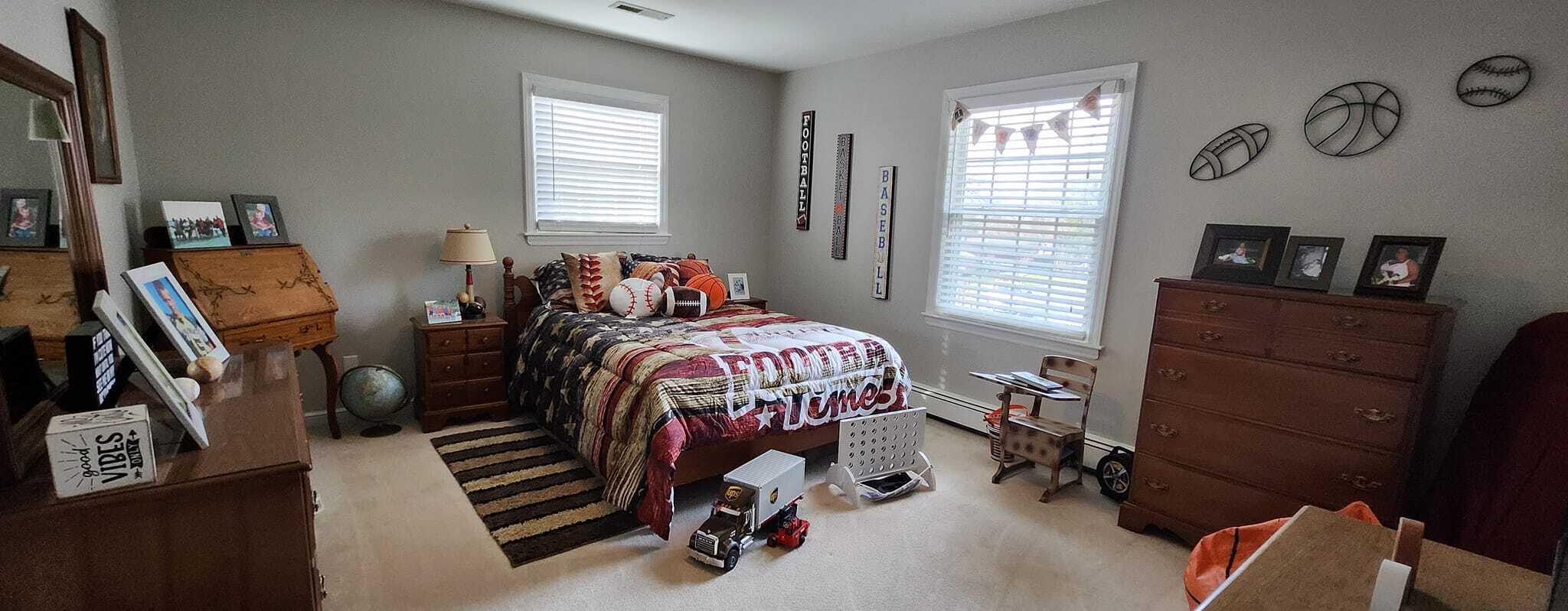 5257 North Spring Drive Northwest Roanoke, VA 24019 - Photo 33 of 47 a bedroom with a bed and wooden floor