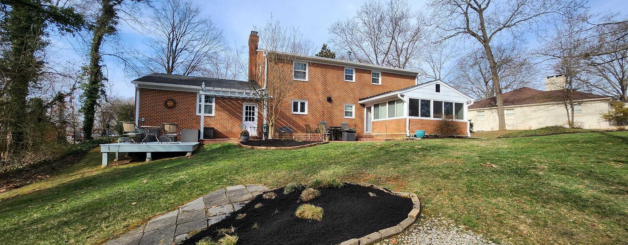 5257 North Spring Drive Northwest Roanoke, VA 24019 - Photo 42 of 47 a view of a house with backyard sitting area and garden