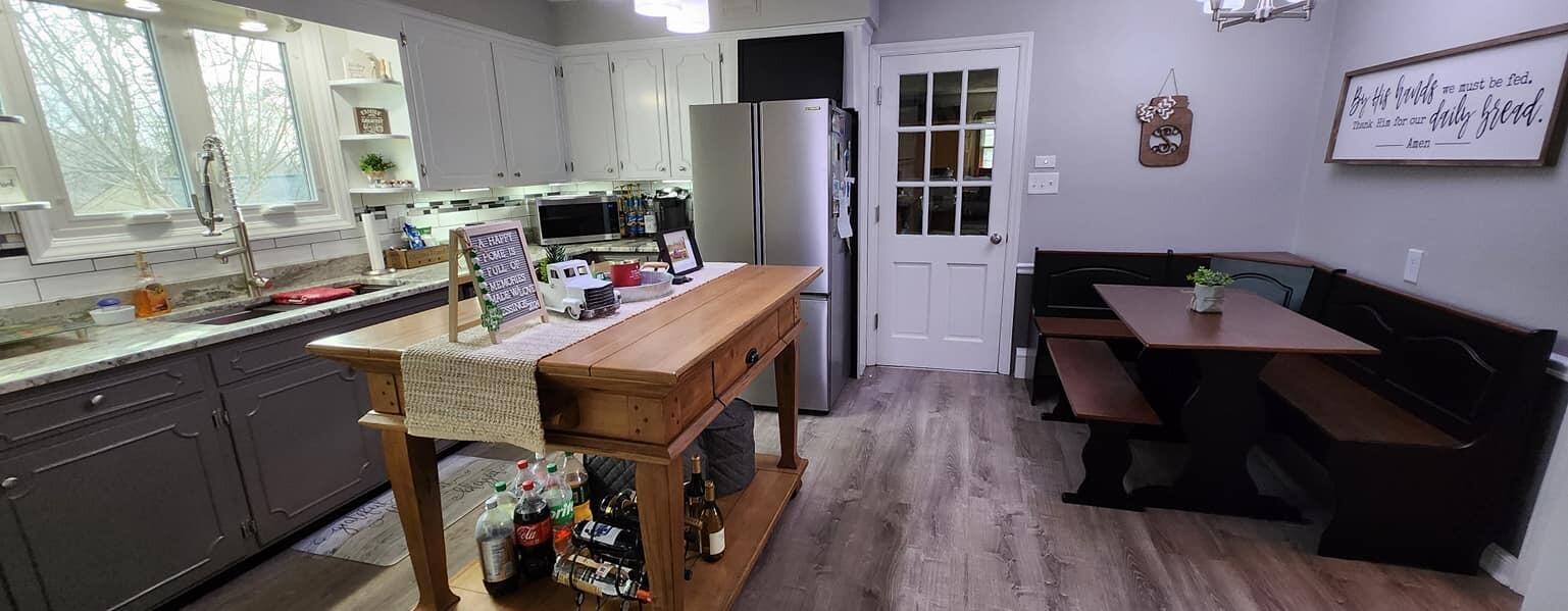 5257 North Spring Drive Northwest Roanoke, VA 24019 - Photo 8 of 47 a view of a dining room with furniture and wooden floor