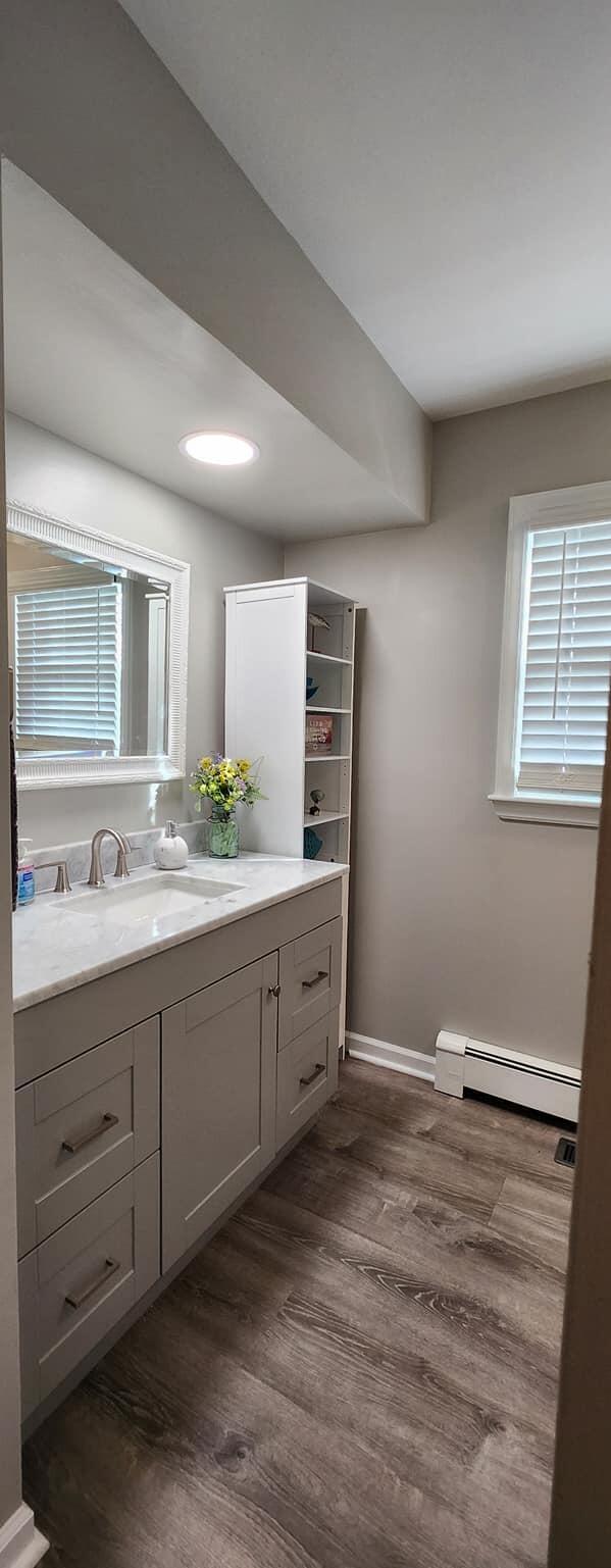 5257 North Spring Drive Northwest Roanoke, VA 24019 - Photo 9 of 47 a bathroom with a double vanity sink and mirror