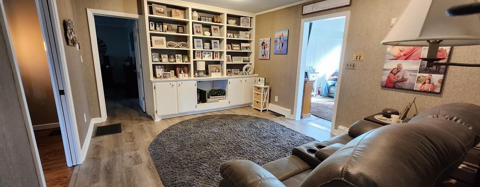 5257 North Spring Drive Northwest Roanoke, VA 24019 - Photo 10 of 47 a living room with furniture and baby crib