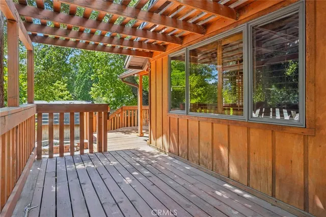 a backyard of a house with a tree