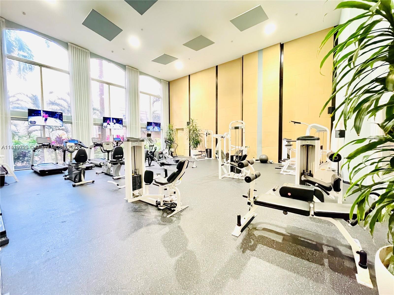 17100 North Bay Road, Unit 1613 Sunny Isles Beach, FL 33160 - Photo 11 of 30 a view of a room with gym equipment