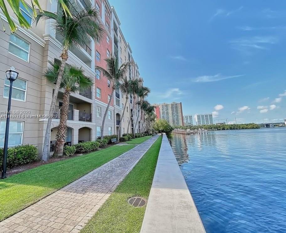 17100 North Bay Road, Unit 1613 Sunny Isles Beach, FL 33160 - Photo 17 of 30 a view of a lake with a house