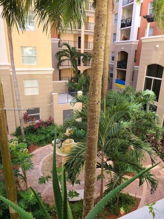 17100 North Bay Road, Unit 1613 Sunny Isles Beach, FL 33160 - Photo 30 of 30 front view of a house with a garden