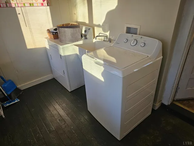 a bedroom with a bed and flat screen tv