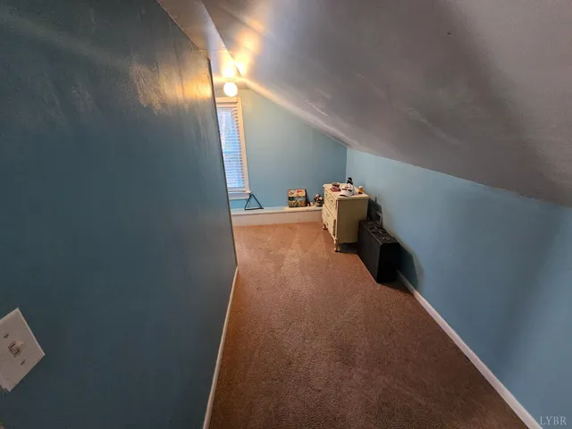 a view of a room with furniture