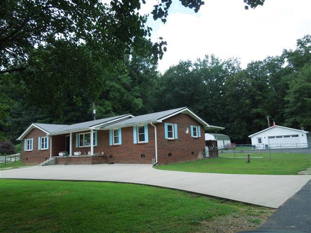 232 Daniel Road Dover, TN 37058 - Photo 3 of 20 Front area of home has a concrete drive and/or walkway.