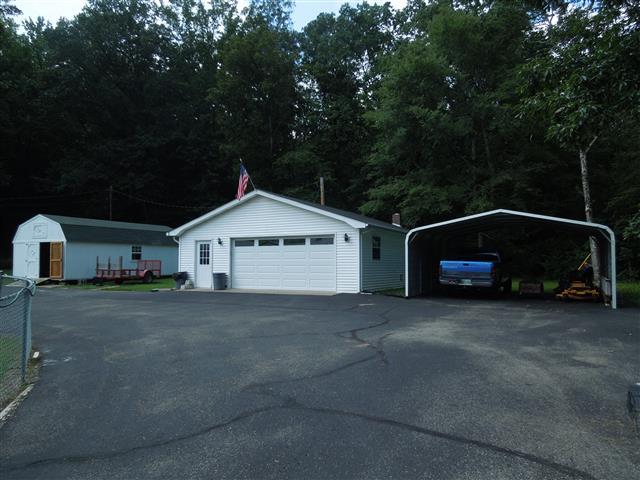 232 Daniel Road Dover, TN 37058 - Photo 6 of 20 Many extras on the property; such as a double detached carport, large detached garage with electric and a nice storage building with electric.
