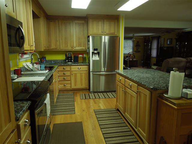 232 Daniel Road Dover, TN 37058 - Photo 10 of 20 Second view of the kitchen with center bar area.