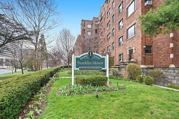 a view of a big yard next to a building