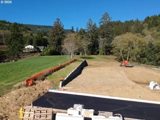a backyard of a house with lots of green space