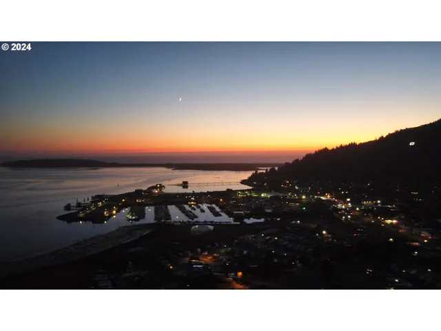 a view of ocean with sunset