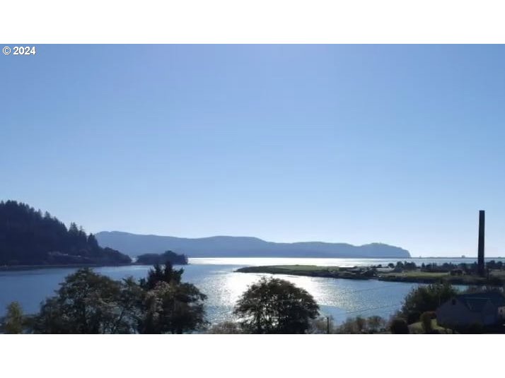 501 Garibaldi Avenue, Unit 5 Garibaldi, OR 97118 - Photo 17 of 17 a view of ocean with sunset